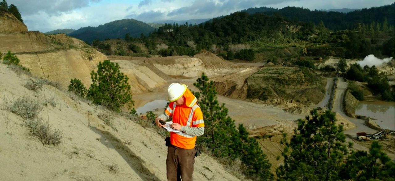 ECI worker ensuring permit compliance at Quail Hollow Quarry restoration project